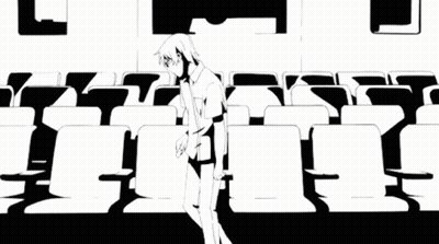 A Couple Of People Sitting In Front Of A Sign That Says ' I 'M ' On It GIF