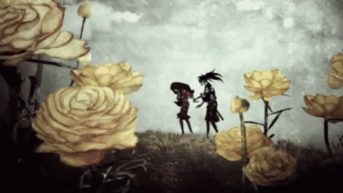 A Couple Of People Standing In A Field Of Yellow Flowers GIF