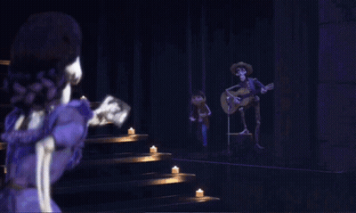 A Couple Of Skeletons Standing Next To Each Other With One Wearing A White Sombrero GIF