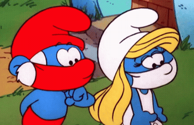 A Couple Of Smurfs Are Standing Next To Each Other And One Has A Red Hat On GIF