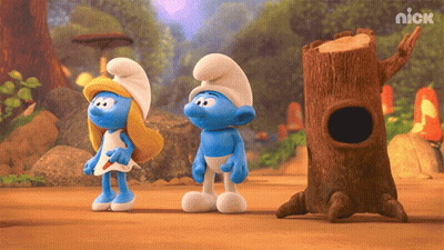 A Couple Of Smurfs Standing Next To A Tree Stump With The Nick Logo On The Bottom GIF
