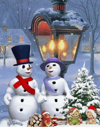 A Couple Of Snowmen Standing Next To Each Other In The Snow GIF
