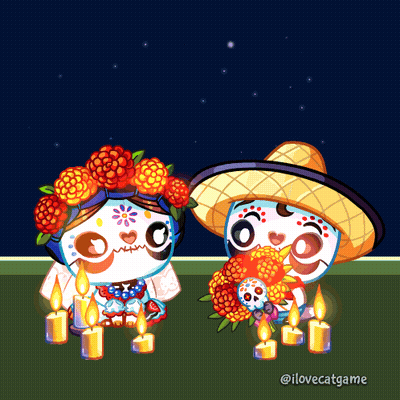 A Couple Of Sugar Skulls Sitting Next To Each Other GIF