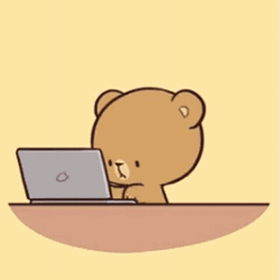 A Couple Of Teddy Bears Are Hugging Each Other While Sitting On A Table . GIF