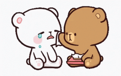 A Couple Of Teddy Bears Are Sitting Next To Each Other . GIF