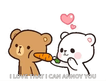 A Couple Of Teddy Bears Are Standing Next To Each Other And One Of Them Is Feeding The Other A Carrot . GIF