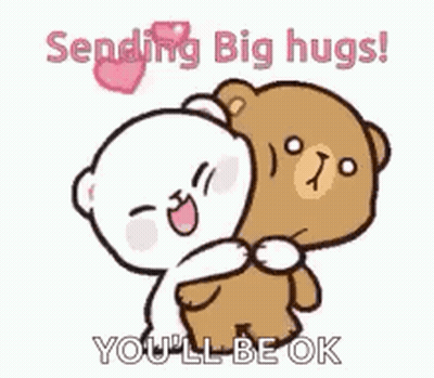 A Couple Of Teddy Bears Hugging Each Other . GIF