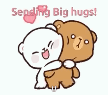 A Couple Of Teddy Bears Hugging Each Other With The Words `` Sending Big Hugs ! '' GIF