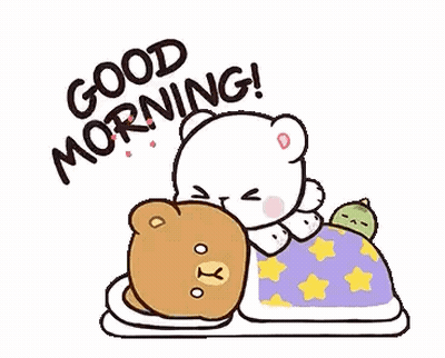 A Couple Of Teddy Bears Laying Next To Each Other On A Bed With A Blanket . GIF