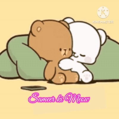 A Couple Of Teddy Bears Laying Next To Each Other On A Blanket . GIF