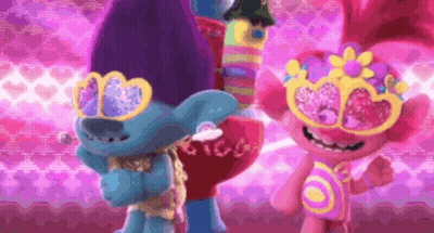 A Couple Of Trolls Wearing Heart Shaped Sunglasses Standing Next To Each Other . GIF