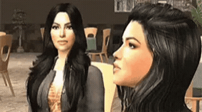 A Couple Of Women Are Sitting Next To Each Other In A Room . GIF