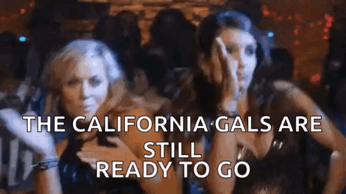 A Couple Of Women Standing Next To Each Other In A Club With The Words `` The California Gals Are Still Ready To Go '' GIF