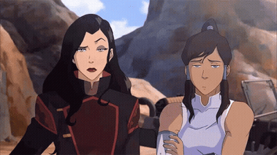 A Couple Of Women Standing Next To Each Other With One Looking Sad GIF