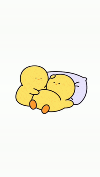 A Couple Of Yellow Ducks Laying Next To Each Other GIF