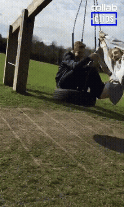 A Couple Sitting On A Tire Swing With The Words Collab Clips On The Bottom GIF