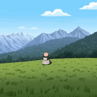 A Cow Is Standing In A Grassy Field With Mountains In The Background . GIF