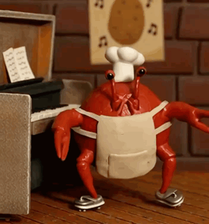 A Crab Wearing A Chef 'S Hat And Apron Is Dancing In Front Of A Piano GIF