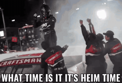 A Craftsman Race Car Is Being Lifted By A Man GIF
