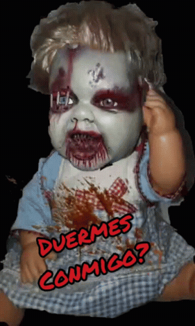A Creepy Baby Doll With The Words Duermes Conmigo Written On The Bottom GIF