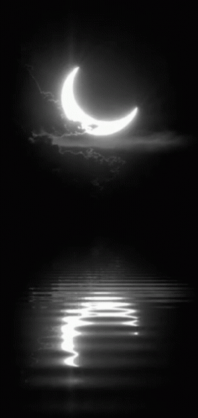A Crescent Moon Is Reflected In The Water GIF