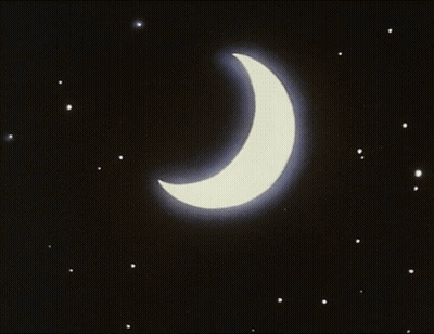 A Crescent Moon With A Blue Beam Coming Out Of It In The Night Sky GIF