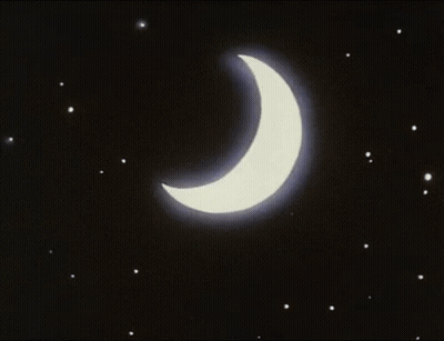 A Crescent Moon With A Blue Beam Coming Out Of It In The Night Sky GIF