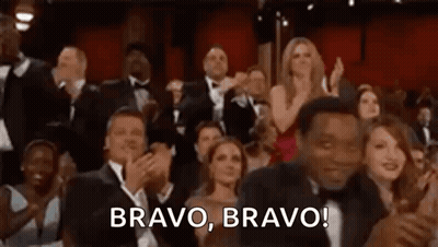 A Crowd Of People Are Applauding At An Oscars Ceremony And A Man Is Saying `` Bravo , Bravo ! '' GIF