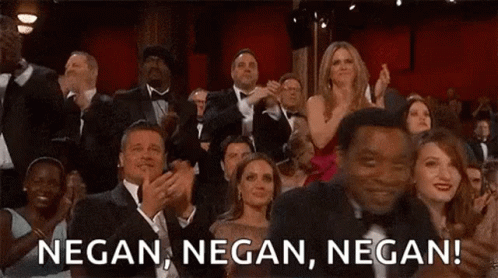 A Crowd Of People Are Applauding At An Oscars Ceremony And A Man Is Saying Negan Negan Negan . GIF
