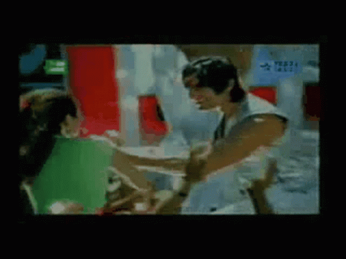 A Crowd Of People Are Gathered In Front Of A Building With A Sign That Says ' Rtc ' On It GIF