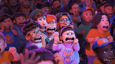 a crowd of people are watching a disney + animated movie