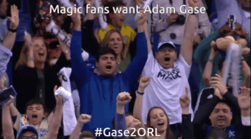 A Crowd Of People Cheering With The Words Magic Fans Want Adam Case GIF