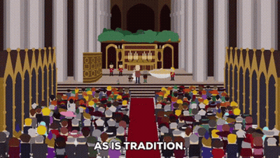 A Crowd Of People Sitting In Front Of A Stage With The Words As Is Tradition GIF