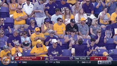 A Crowd Of People Watching A Game Between Virginia Tech And East Carolina GIF