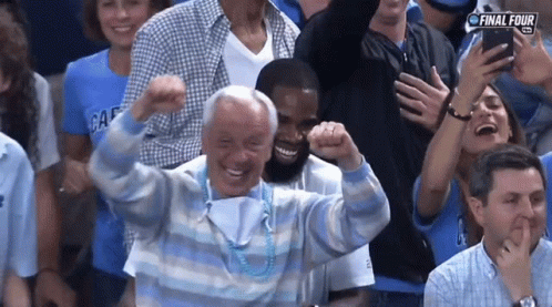 A Crowd Of People Watching A Game With The Final Four Written On The Bottom GIF