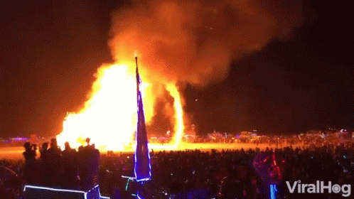 A Crowd Of People Watching A Large Fire With The Words Viralhog On The Bottom Left GIF