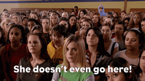 A Crowd Of People With The Words She Does N't Even Go Here Written On The Bottom GIF