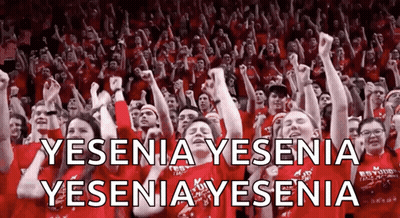 A Crowd Of People With Their Fists In The Air And The Words Yesenia Yesenia Yesenia GIF
