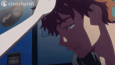 A Crunchyroll Logo Can Be Seen In The Background Of A Man 'S Face GIF
