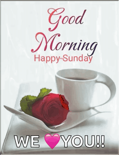 A Cup Of Coffee And A Rose On A Saucer On A Table . GIF