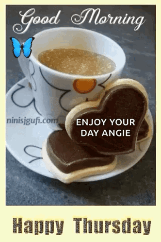 A Cup Of Coffee And Two Heart Shaped Cookies On A Saucer GIF