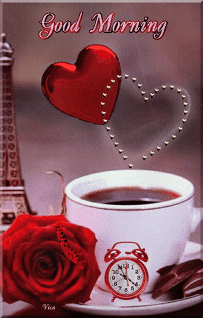 A Cup Of Coffee Next To A Red Rose And An Alarm Clock That Says Good Morning On It GIF