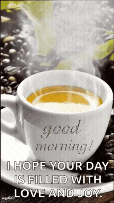 A Cup Of Coffee On A Saucer With The Words `` Good Morning ! `` I Hope Your Day Is Filled With Love And Joy . GIF