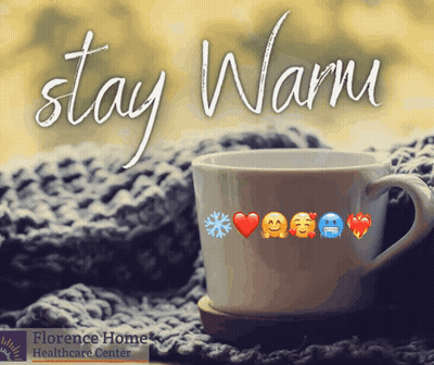 A Cup Of Coffee Sitting On A Blanket With The Words Stay Warm Written Above It GIF
