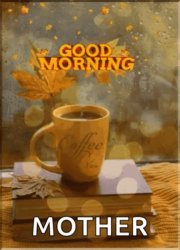 A Cup Of Coffee Sitting On Top Of A Book With The Words Good Morning Mother Written On It GIF