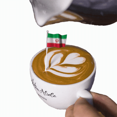 A Cup Of Coffee With A Flag On Top That Says " Written Aliola " GIF