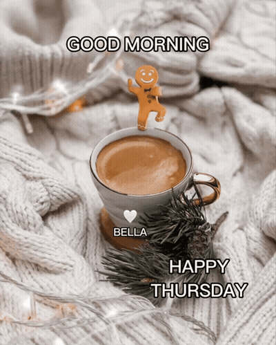 A Cup Of Coffee With A Gingerbread Man On Top And The Words Good Morning Bella Happy Thursday Below It GIF