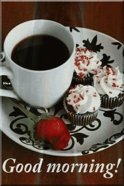A Cup Of Coffee With Cupcakes And A Rose On A Plate With The Words Good Morning GIF