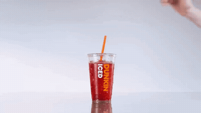 A Cup Of Dunkin ' Donuts Iced Tea With Condensation On It GIF