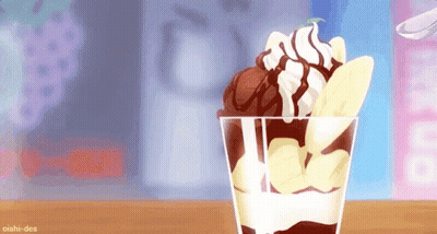 A Cup Of Ice Cream With Whipped Cream , Banana Slices And Chocolate Sauce On A Table . GIF